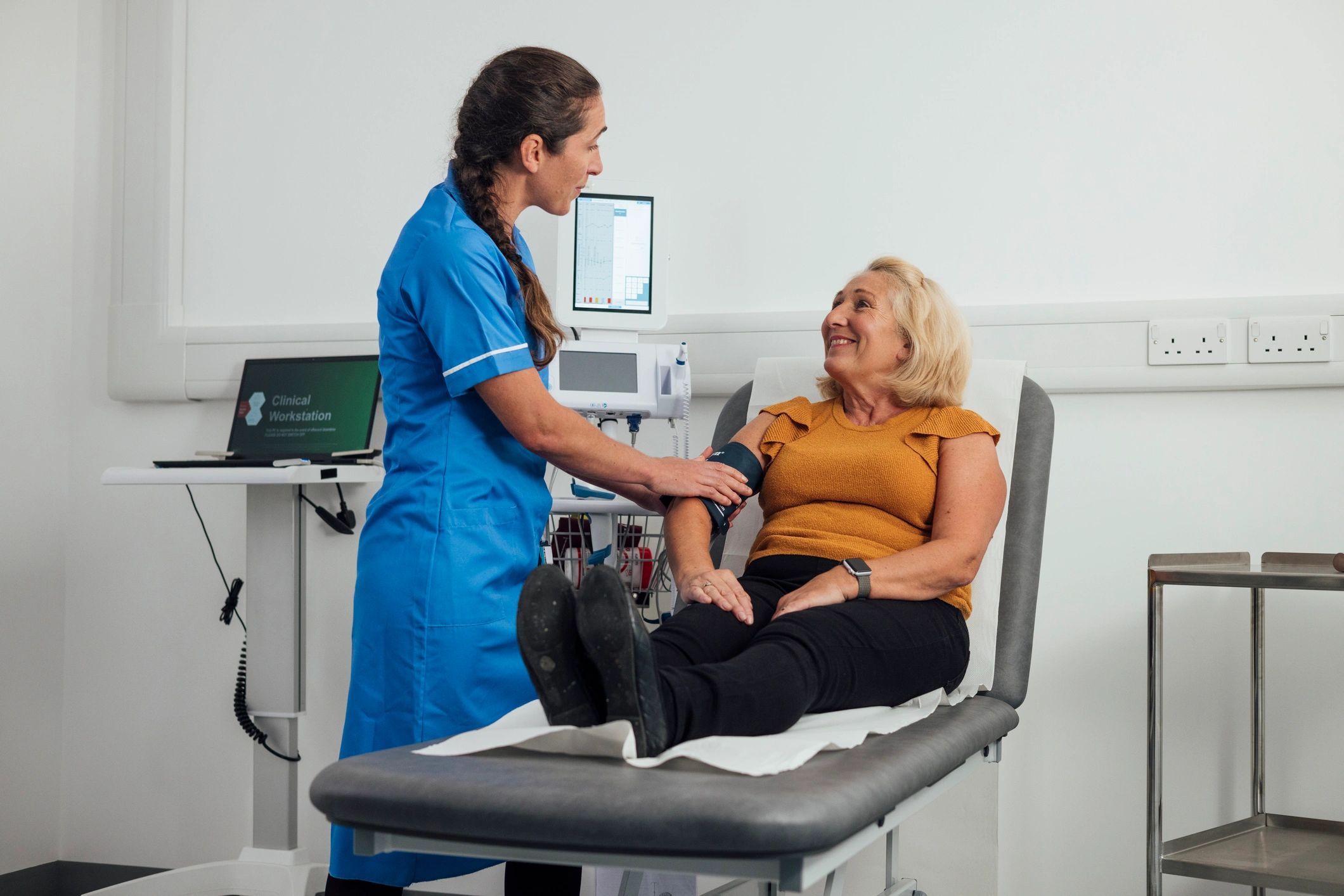 Patient receiving care from a medical professional in a clinic